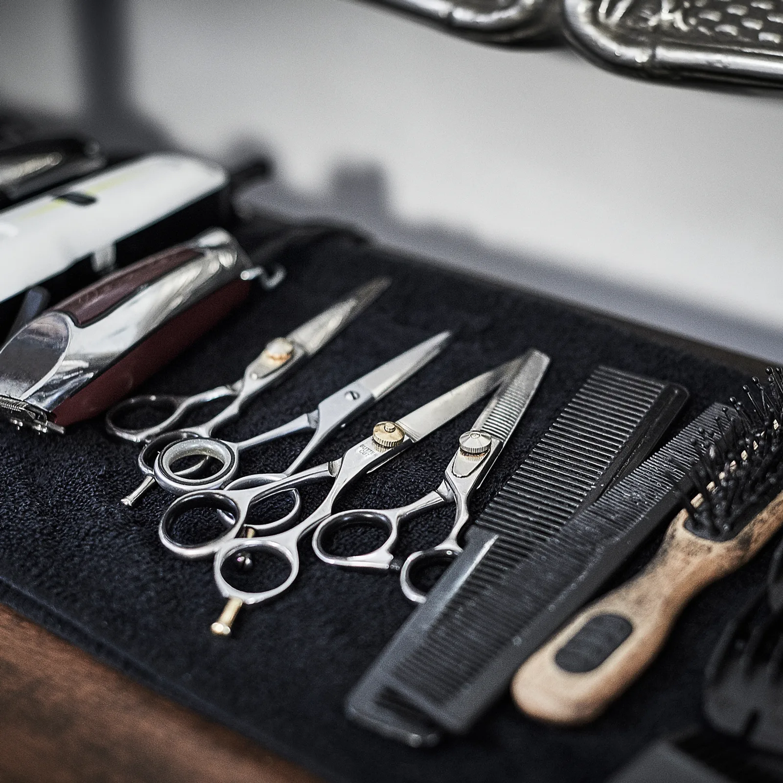 Barber tools on the clinic floor at Scales Barber Academy