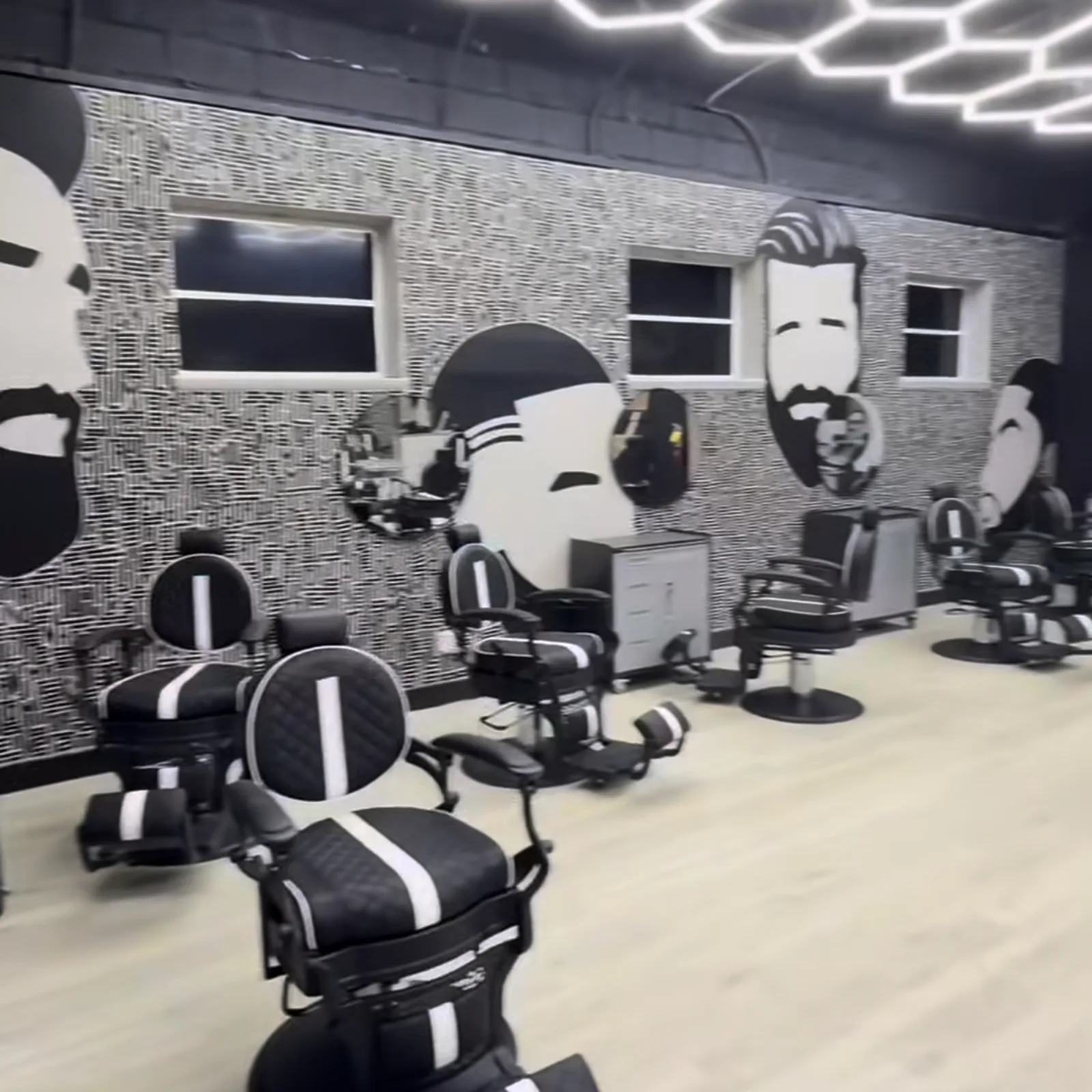 Students training at Scales Barber Academy